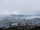 Best Things To Do in North Bergen at Night: Your 2026 Local Guide Aerial view of Bergen, Norway, with its harbor and surrounding hills on a cloudy day.
