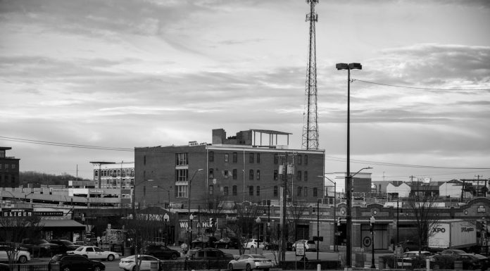 BREAKING: Hoboken Adds 60 Uptown Parking Spaces Black and white view of an urban cityscape in Tulsa, Oklahoma featuring buildings and parking lots.