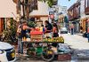 Vibrant street market scene with a fruit vendor in Cartagena, Colombia's historic district.