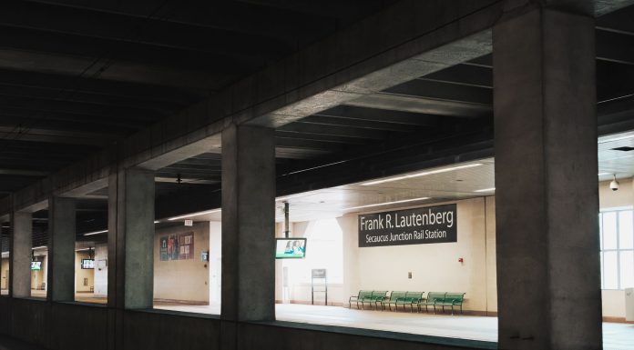 Public Transportation Guide for Elizabeth Residents (2026 Update) Empty platform at Frank R. Lautenberg Secaucus Junction Rail Station in New Jersey.