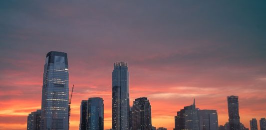 Real Estate Trends in Union City for 2026: What Buyers and Sellers Need to Know Stunning view of New York City skyline with a vibrant sunset reflecting on skyscrapers.
