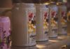 Close-up of colorful beer steins at Oktoberfest in Munich, Bavaria, highlighting festive designs.